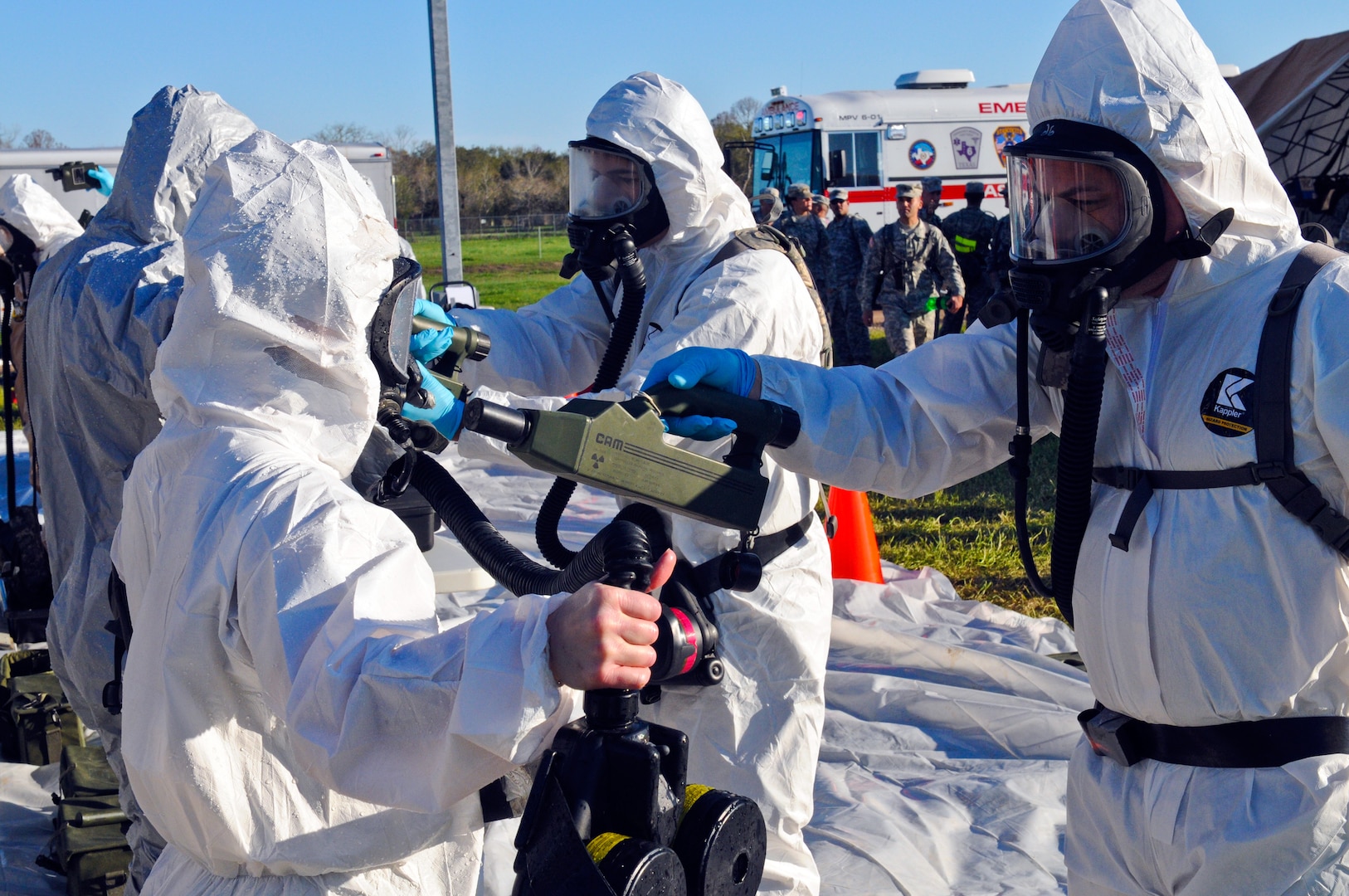 Guard members with Joint Task Force-71 support local and civil authorities during the El Campo Memorial Hospital Exercise, March 3, 2012. The training event, which simulated several hazardous and first response incidents, tested the alert and response capabilities of the different participating agencies. JTF-71 frequently engages joint and interagency exercises to improve department cooperation and communication.