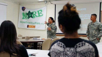 Army Staff Sgt. Celeste Paglinawan and Army Sgt. Bernie Bumanglag, both with the Hawaii National Guard, facilitate the troubled youth of the Kokua Ohana Aloha Program.