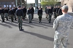 Teens get into formation under the supervision of Army Spc. Ian Carefoot, an instructor at the Project Challenge training facility, here Feb. 28, 2011. The course is operated by the Arizona National Guard, civilians, veteran service members, as well as Guard members, who provide coaching and mentorship to teens in need of redirecting their lives' decisions.