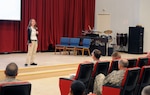 Valecia Ross, Army Career and Alumni Program counselor and Ft. Polk, La., resident, listens to a question from the audience during her transition briefing at the Zone 1 Chapel March 6, 2012. Ross and two other ACAP counselors visited Kuwait to inform Soldiers who are soon departing active-duty status about the opportunities available to them as they transition back to civilian life. Ross informed the Third Army soldiers about different services provided by the ACAP counselors to ensure service members are given the chance to smoothly make the move from military to civilian life.