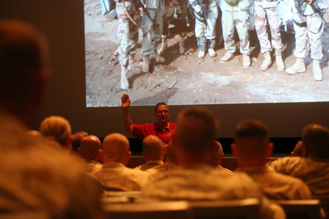 Retired Marine Lieutenant Gen. John F. Sattler presents a behind the scenes look into development and operations during the second Battle of Fallujah during a Professional Military Education class aboard Camp Pendleton, Calif., June 18, 2014.  Sattler gave the Marines an idea of how plans were developed and executed during the battle.