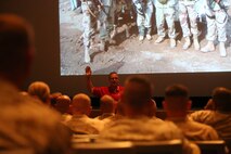 Retired Marine Lieutenant Gen. John F. Sattler presents a behind the scenes look into development and operations during the second Battle of Fallujah during a Professional Military Education class aboard Camp Pendleton, Calif., June 18, 2014.  Sattler gave the Marines an idea of how plans were developed and executed during the battle.