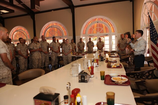 Marines stationed aboard Marine Corps Recruit Depot San Diego talk to Cpl. William K. Carpenter at Duncan Hall about topics such as his future plans and what he has overcome since his injuries June 23. Carpenter was recently presented the Medal of Honor and is the eighth living recipient of the award.