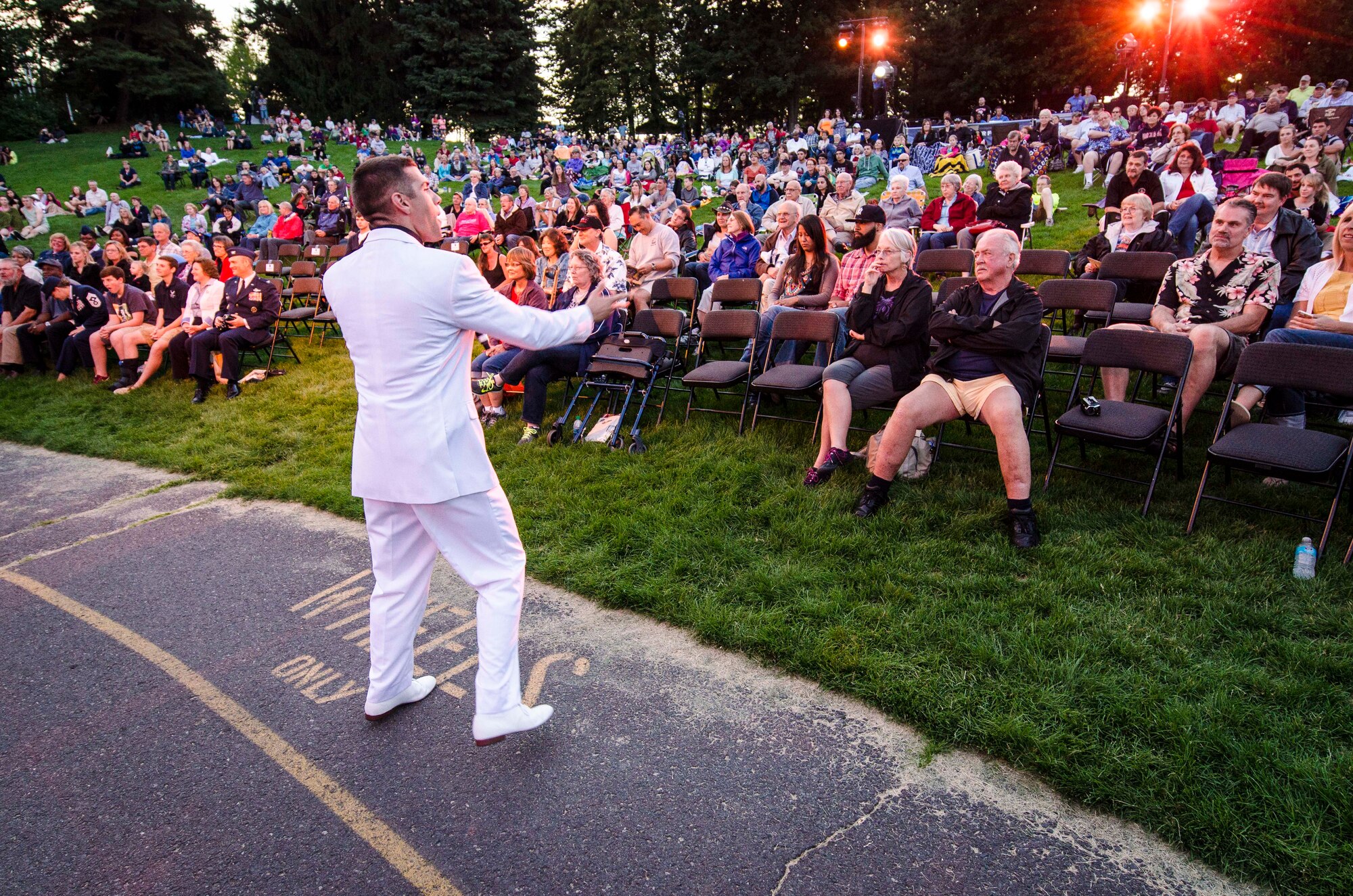 Senior Airman Andrew Harris performs for the Spokane community and Team Fairchild during the Tops In Blue show at the Riverfront Park Lilac Bowl in Spokane, Wash., June 21, 2014, while on their 60th anniversary tour with performances ranging from classic rock to today’s Top 40 hits. Tops In Blue is the Air Force’s premier entertainment showcase team and composed of 35 to 40 of the most talented vocalists, musicians, dancers, and technicians anywhere. Their primary purpose is to perform for military personnel and their families throughout the world. Harris is a vocalist and a 31st Intelligence Squadron cryptologic linguist journeyman from Fort Gordon, Ga., and a West Palm Beach, Fla., native. (U.S. Air Force photo by Staff Sgt. Benjamin W. Stratton/Released)