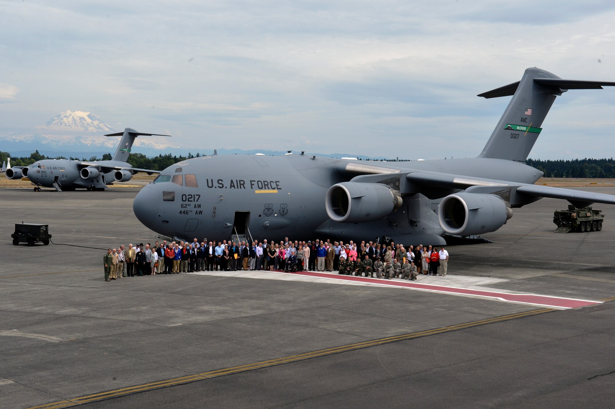 Civilian Aides to the Secretary of the U.S. Army leaders pause their tour to take a photo with a C-17 Globemaster III during the 2014 National CASA Conference at Joint Base Lewis-McChord, Wash. In addition to meeting annual requirements, the CASA leadership visited and observed the capabilities and skills resident in the Soldiers, Airmen and civilians stationed at JBLM. (U.S. Air Force photo/Staff Sgt. Russ Jackson)