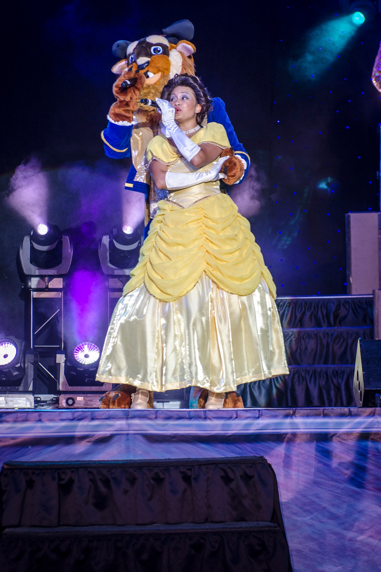 Staff Sgt. Gina Lavender performs for the Spokane community and Team Fairchild during the Tops In Blue show at the Riverfront Park Lilac Bowl in Spokane, Wash., June 21, 2014, while on their 60th anniversary tour with performances ranging from classic rock to today’s Top 40 hits. Tops In Blue is the Air Force’s premier entertainment showcase team and composed of 35 to 40 of the most talented vocalists, musicians, dancers, and technicians anywhere. Their primary purpose is to perform for military personnel and their families throughout the world. Lavender is a vocalist and a 149th Medical Group aerospace medical service journeyman from Joint Base San Antonio-Lackland, Texas, and a Killeen, Texas, native. (U.S. Air Force photo by Staff Sgt. Benjamin W. Stratton/Released)