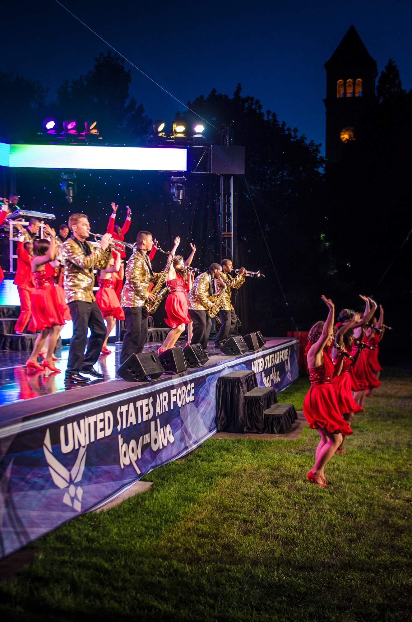 Tops In Blue performs for the Spokane community and Team Fairchild at the Riverfront Park Lilac Bowl in Spokane, Wash., June 21, 2014, while on their 60th anniversary tour with performances ranging from classic rock to today’s Top 40 hits. Tops In Blue is the Air Force’s premier entertainment showcase team and composed of 35 to 40 of the most talented vocalists, musicians, dancers, and technicians anywhere. Their primary purpose is to perform for military personnel and their families throughout the world. (U.S. Air Force photo by Staff Sgt. Benjamin W. Stratton/Released)