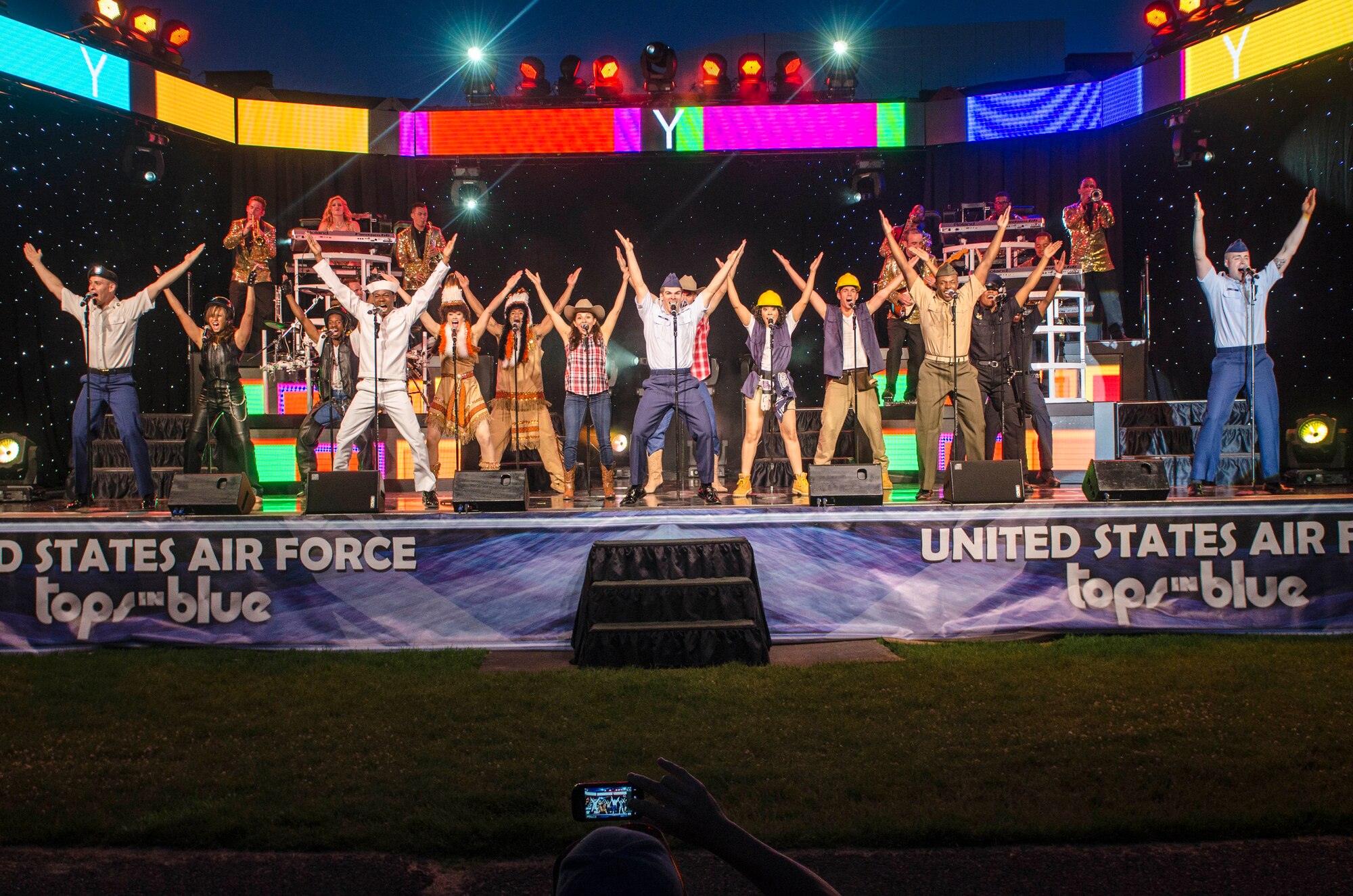 Tops In Blue performs for the Spokane community and Team Fairchild at the Riverfront Park Lilac Bowl in Spokane, Wash., June 21, 2014, while on their 60th anniversary tour with performances ranging from classic rock to today’s Top 40 hits. Tops In Blue is the Air Force’s premier entertainment showcase team and composed of 35 to 40 of the most talented vocalists, musicians, dancers, and technicians anywhere. Their primary purpose is to perform for military personnel and their families throughout the world. (U.S. Air Force photo by Staff Sgt. Benjamin W. Stratton/Released)