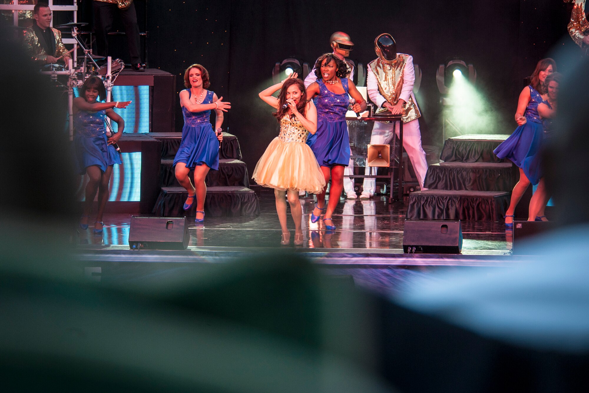 Tops In Blue performs for the Spokane community and Team Fairchild at the Riverfront Park Lilac Bowl in Spokane, Wash., June 21, 2014, while on their 60th anniversary tour with performances ranging from classic rock to today’s Top 40 hits. Tops In Blue is the Air Force’s premier entertainment showcase team and composed of 35 to 40 of the most talented vocalists, musicians, dancers, and technicians anywhere. Their primary purpose is to perform for military personnel and their families throughout the world. (U.S. Air Force photo by Staff Sgt. Benjamin W. Stratton/Released)