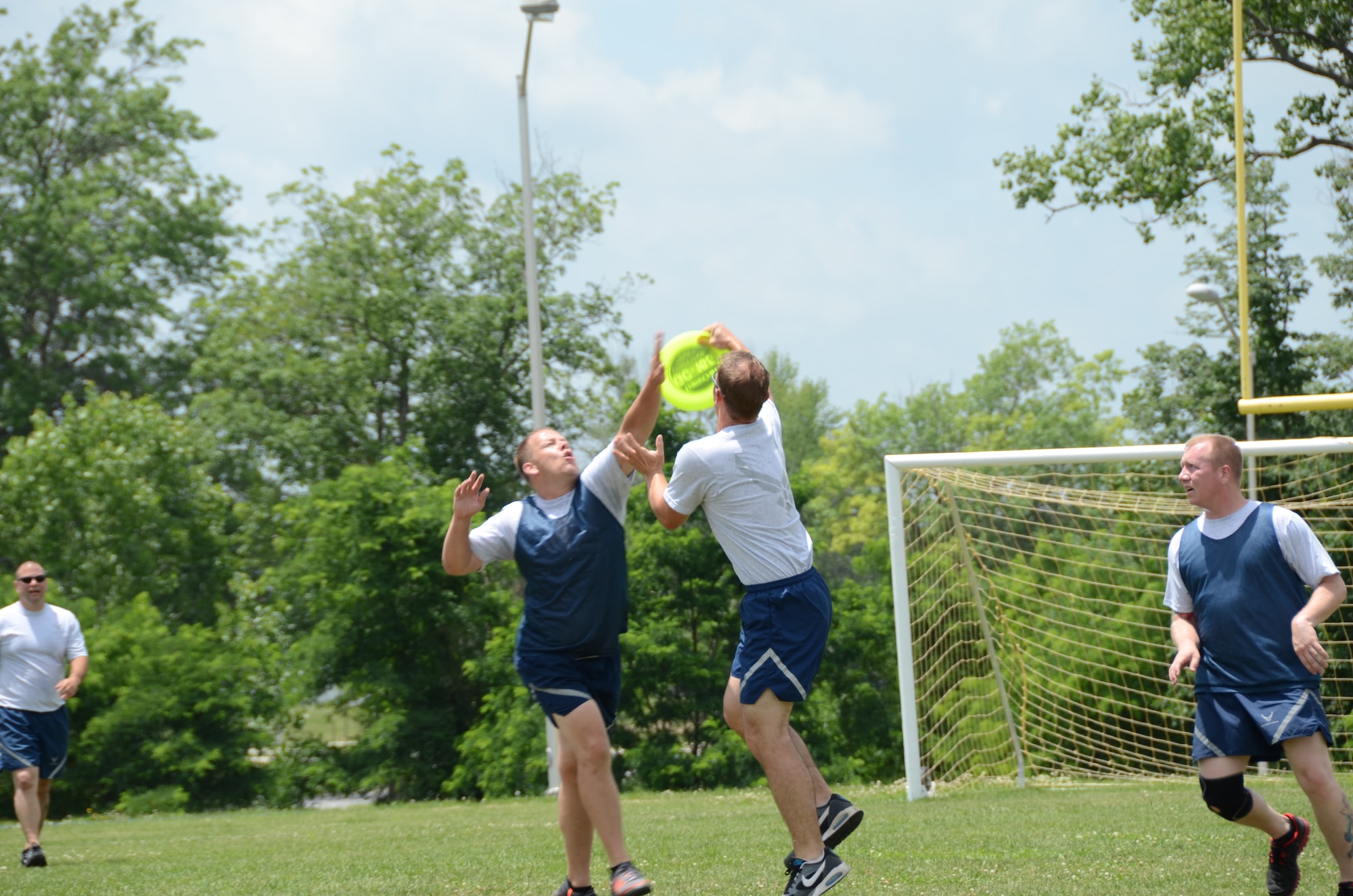 Citizen Airmen of the 131st Bomb Wing take time out of their training day for a teambuilding game of ultimate frisbee during AT week June 16-22, 2014, at Whiteman Air Force Base, Missouri.  (U.S. Air National Guard photo by Airman Halley Burgess)