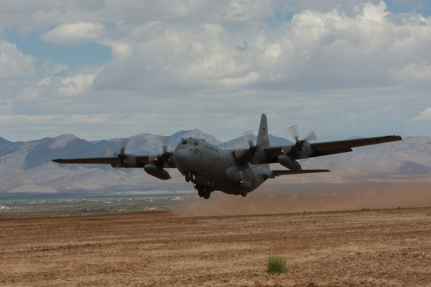 A C-130 with the 700th Airlift Squadron, Georgia Air Force Reserve, Takes off from Hubbard Landing Zone at Fort Huachuca Ariz., on June 18, 2014. The 700th is participatingin a two-week tactics school with The Advanced Airlift Tactics Training Center attached to the 139th Airlift Wing Missouri Air National Guard. (U.S. Air National Guard photo by Senior Airman Sheldon Thompson/released)