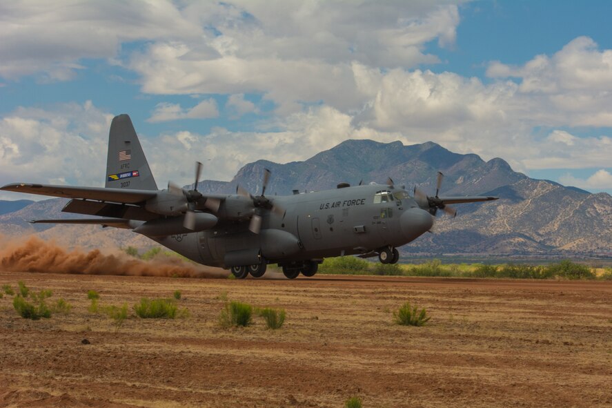 A C-130 with the 700th Airlift Squadron, Georgia Air Force Reserve, lands on Hubbard Landing Zone at Fort Huachuca Ariz., on June 18, 2014. The 700th is participating in a two-week tactics school with The Advanced Airlift Tactics Training Center attached to the 139th Airlift Wing Missouri Air National Guard. (U.S. Air National Guard photo by Senior Airman Sheldon Thompson/released)