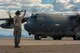 Master Sgt. Paul Jones, A Crew Chief with the 106th Rescue Wing, marshals a HC-130 before take of at Fort Huachuca Ariz., on June 18, 2014. Msgt. Jones provides maintenance support to the 102d Rescue Squadron while they participate in a two-week tactics school with The Advanced Airlift Tactics Training Center attached to the 139th Airlift Wing Missouri Air National Guard. (U.S. Air National Guard photo by Senior Airman Sheldon Thompson/released)