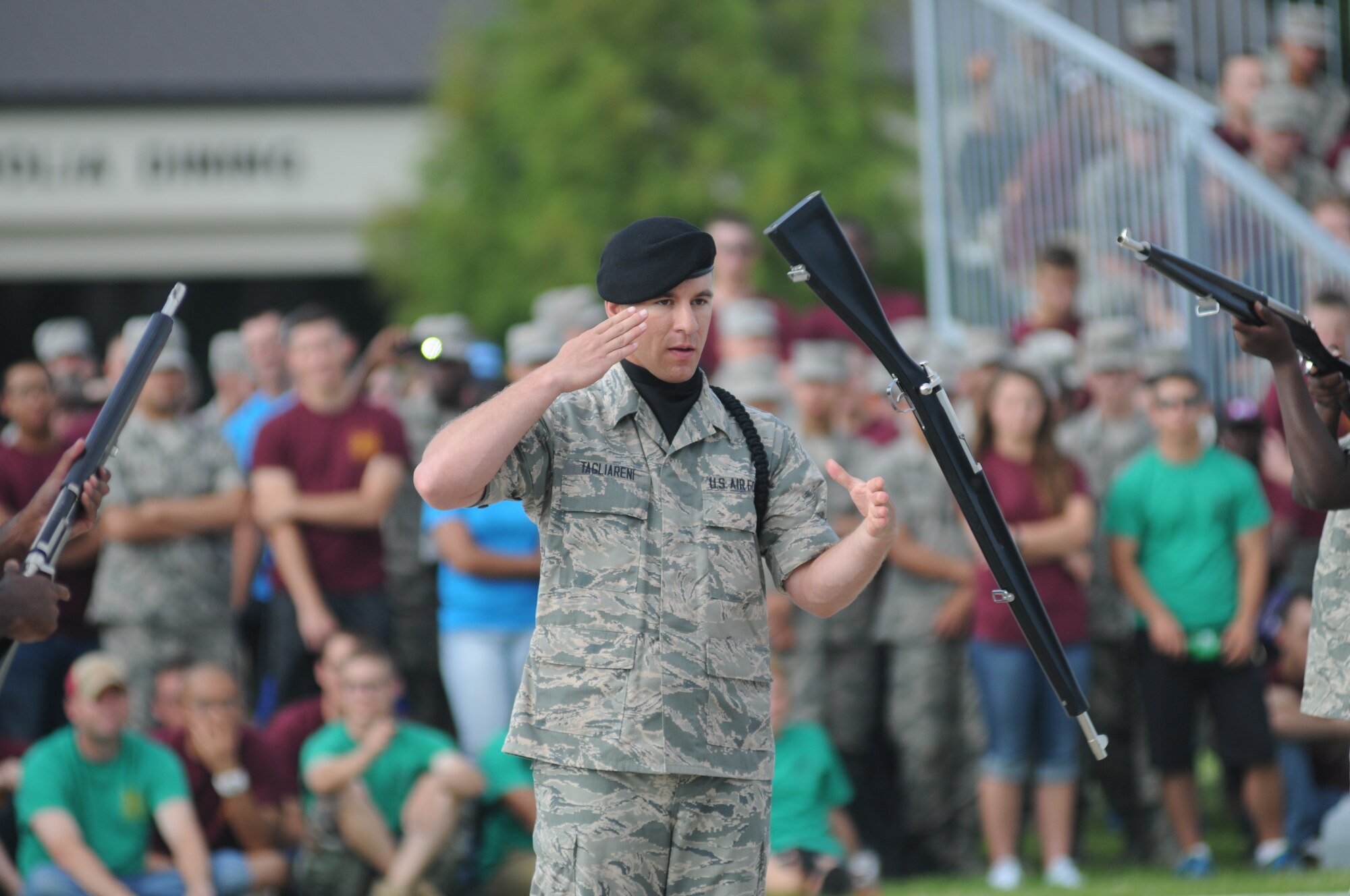 Airman 1st Class Michael Tagliareni, 334th Training Squadron, requests permission to exit the field of freestyle drill competition during the 81st Training Group drill down June 20, 2014, at the triangle, Keesler Air Force Base, Miss. The 334th Gators placed third in the freestyle competition and overall. (U.S. Air Force photo by Kemberly Groue)