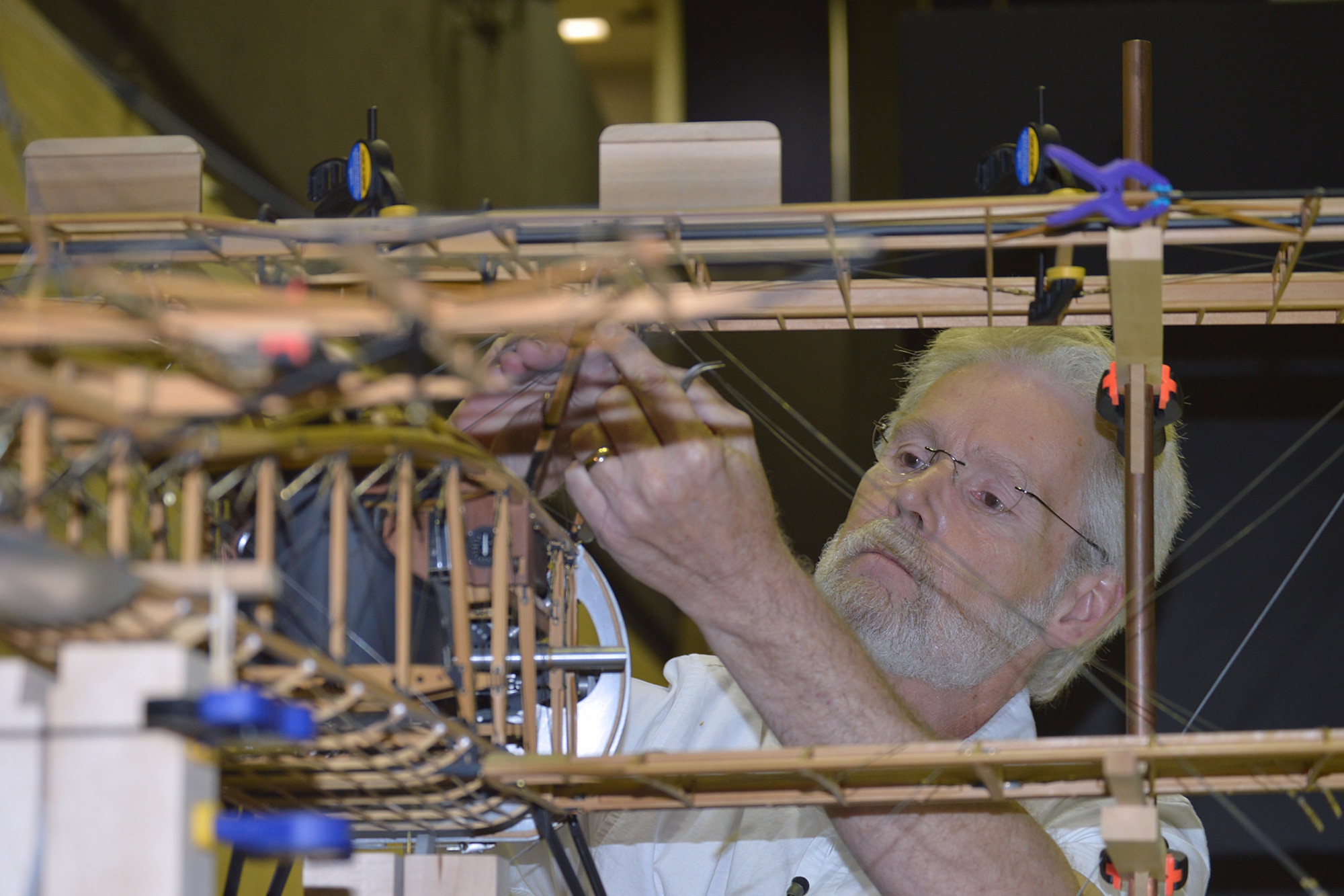 DAYTON, Ohio --  Aircraft model builder Don Gentry donated his 1/5 scale model of a Thomas-Morse S4C Scout to the National Museum of the U.S. Air Force. Fabrication involved roughly 7,000 man hours spread over 5 years, scratch built by Gentry. Plans call for the model to be on display in the museum's Early Years Gallery. (U.S. Air Force photo by Ken LaRock) 
