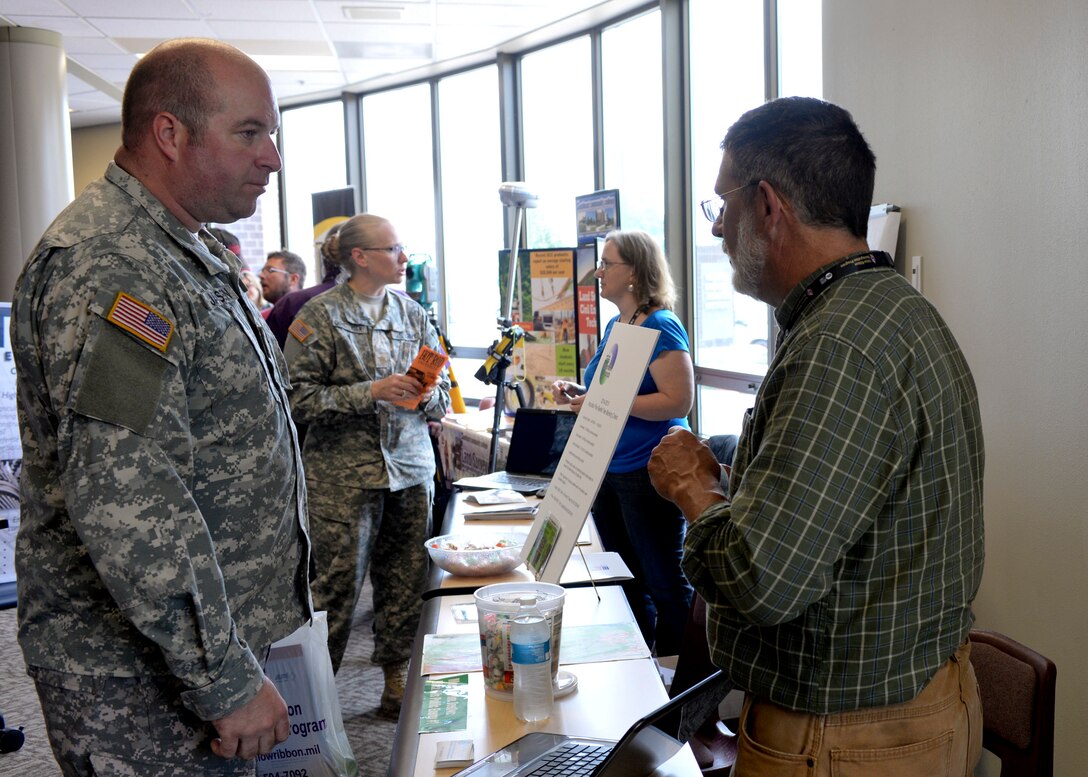 U.S. Army Sgt. Ragen Janssen, South Dakota National Guard 935th Aviation Support Battalion, seeks employment opportunities at the Black Hills Veterans Job Fair hosted by Western Dakota Technical Institute, Rapid City, S.D., June 18, 2014. Approximately 90 employers took part in the fair with a focus on hiring veterans. (U.S. Air Force photo by Senior Airman Anania Tekurio/Released)