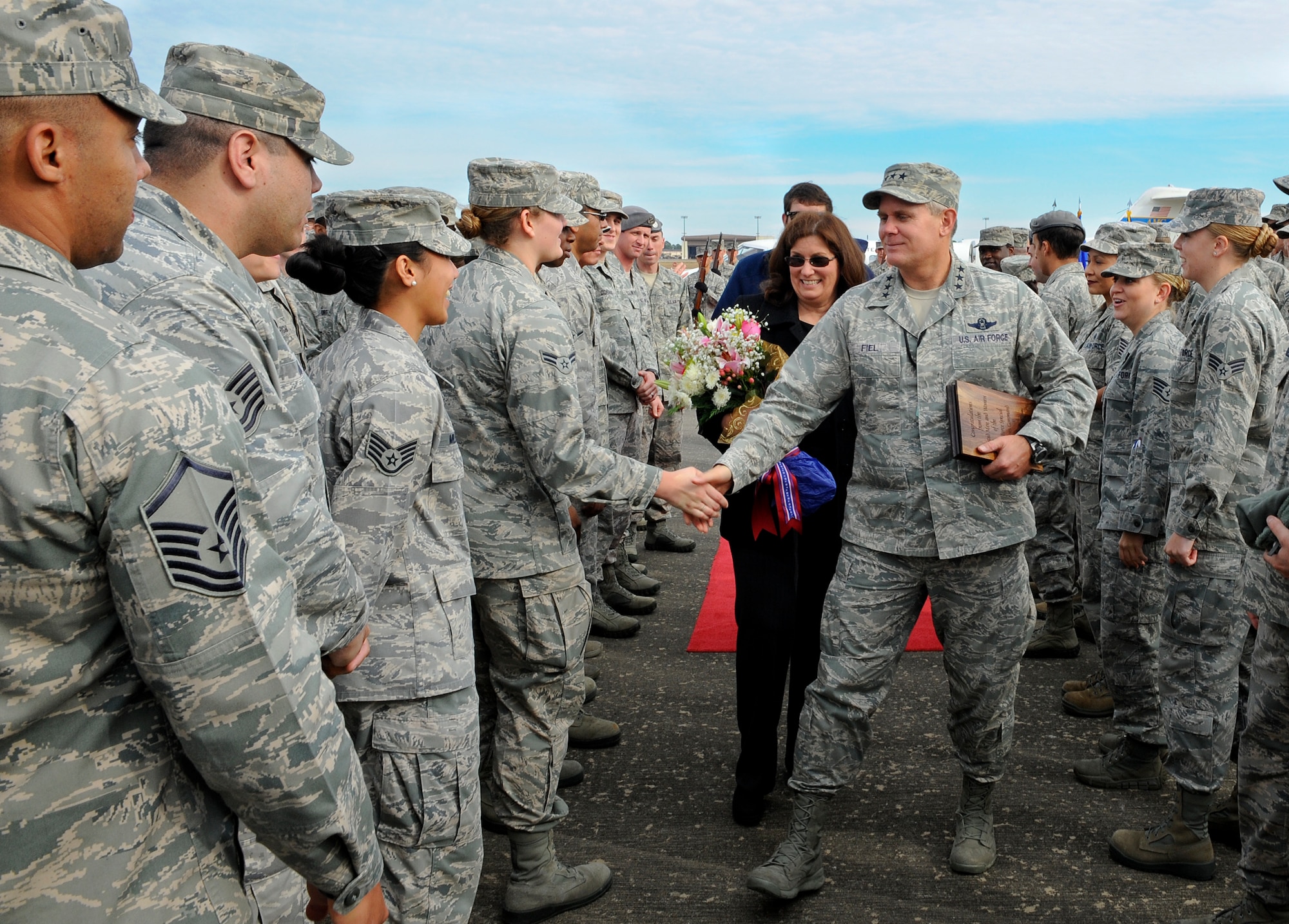 Lt. Gen. Eric Fiel, Air Force Special Operations Command commander, shakes hands with enlisted Air Commandos after being nominated for the Order of the Sword at Hurlburt Field, Dec. 13. The Order of the Sword is the highest honor the enlisted corps can bestow upon an individual. (U.S. Air Force photo/Airman 1st Class Jeff Parkinson)


