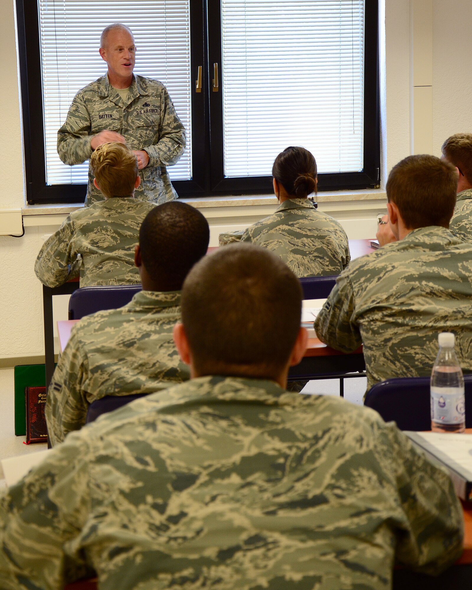 Chief Master Sgt. Frank H. Batten III, 86th Airlift Wing command chief, talks with Airmen at the First Term Airman Center, June 23, 2014, at Ramstein Air Base, Germany. Batten spoke with the Airmen about their goals and dreams that led them to join the Air Force. He encouraged the Airmen to always remember those goals when making decisions. (U.S. Air Force photo/Senior Airman Timothy Moore/Released)