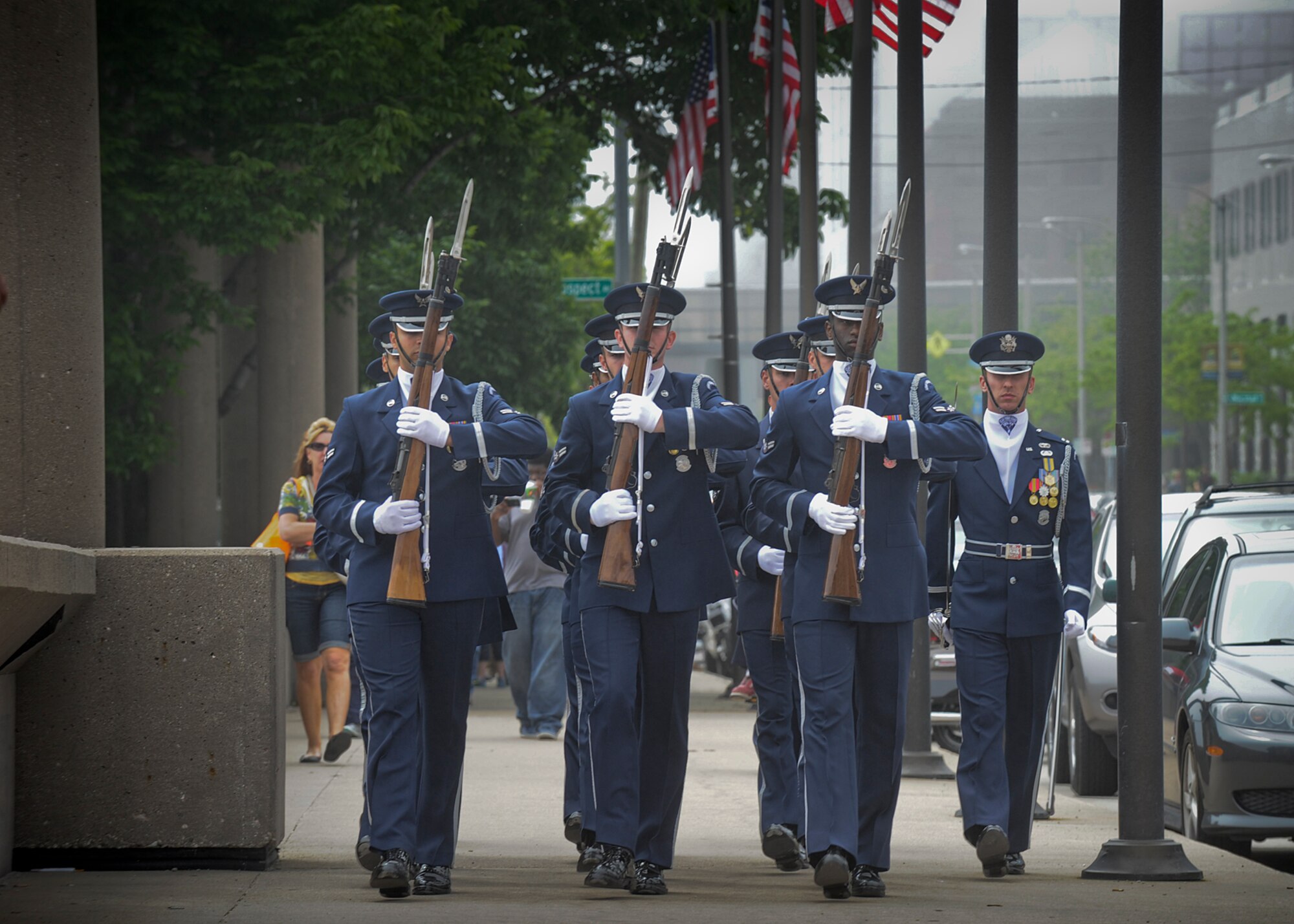 The U.S. Air Force Drill Team marches through downtown Milwaukee en route to the team’s performance at the Milwaukee War Memorial June 22, 2014. The Drill Team is on a nine-day, seven-city, 10-performance tour across Wisconsin, Minnesota, South Dakota, Wyoming, and Nebraska. (U.S. Air Force Photo/1st Lt. Nathan Wallin)