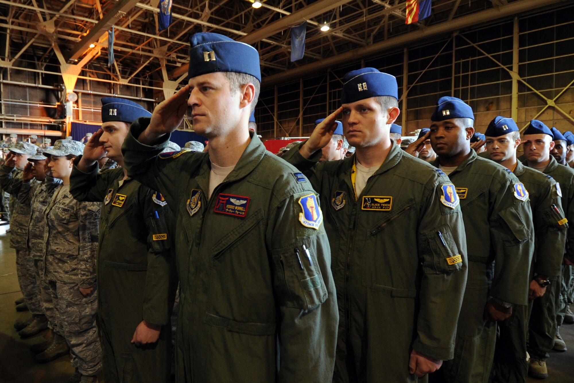 Airmen from the 35th Fighter Wing render a final salute to outgoing 35 FW Commander Col. Stephen Williams during a change-of-command ceremony at Misawa Air Base, Japan, June 24, 2014. Williams was succeeded by Col. Timothy Sundvall, who was previously stationed at Misawa AB from 1995 to 1998. ((U.S. Air Force photo/Tech. Sgt. April Quintanilla)
