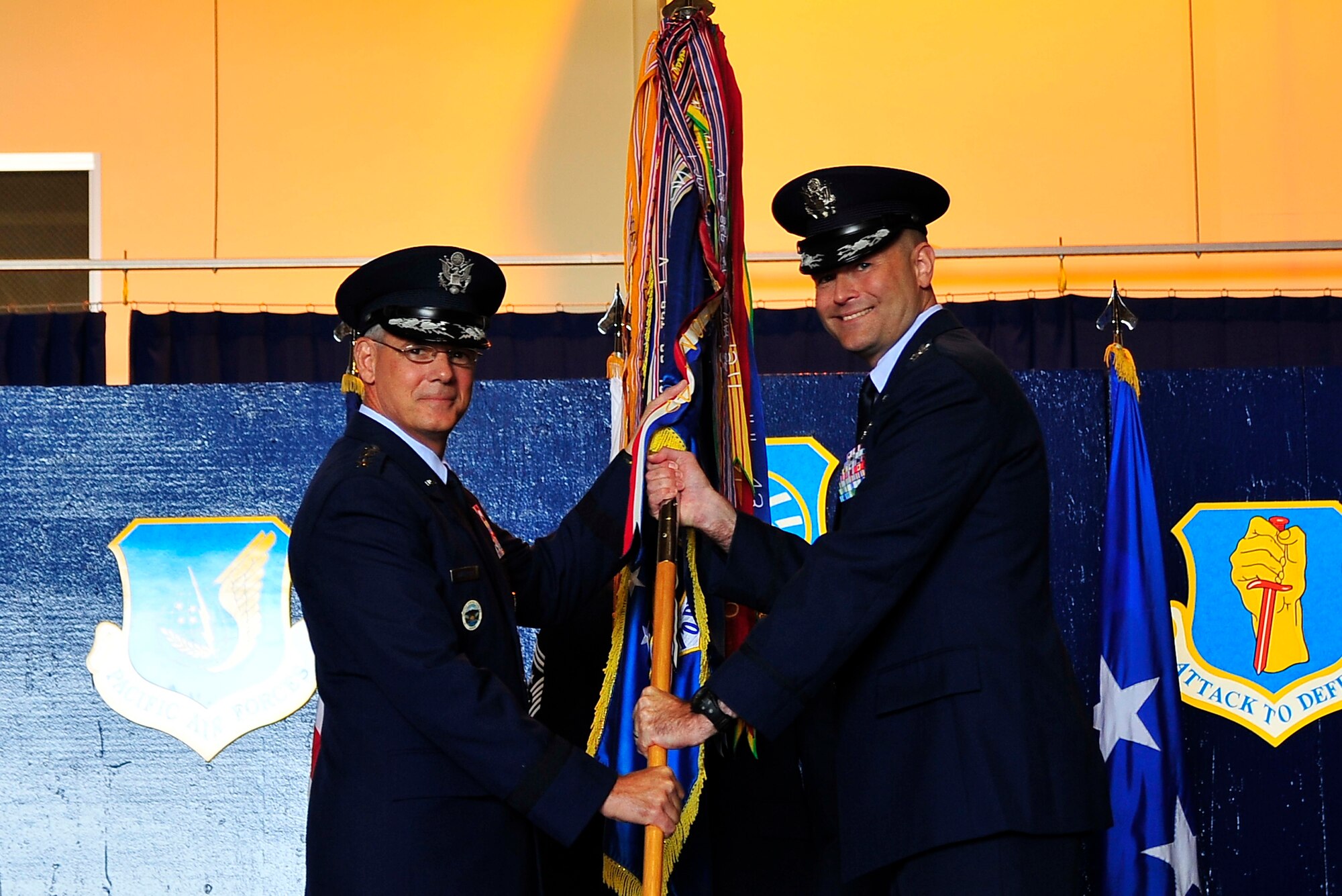 U.S. Air Force Col. Timothy Sundvall, right, assumes command of the 35th Fighter Wing alongside Lt. Gen. Sam Angelella, U.S. Forces Japan and 5th Air Force commander, during a change-of-command ceremony at Misawa Air Base, Japan, June 24, 2014. Sundvall previously served as the vice commander of the 8th Fighter Wing at Kunsan AB, Republic of Korea. (U.S. Air Force photo/Tech. Sgt. April Quintanilla)