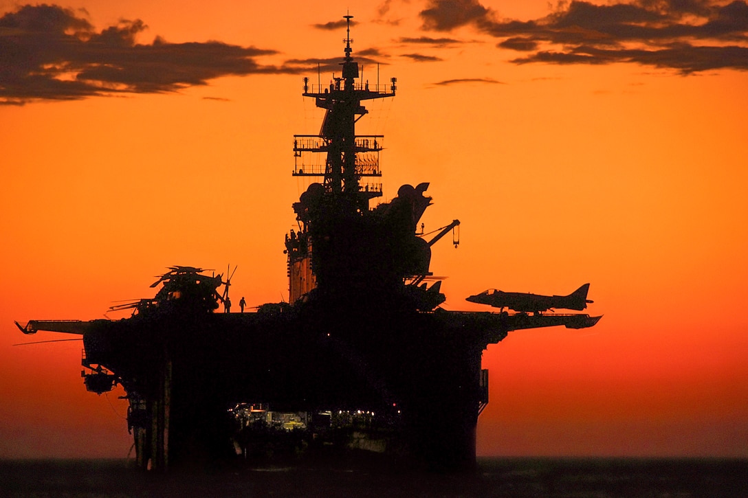 The sun sets in the Pacific Ocean as the amphibious assault ship USS Makin Island and the embarked 11th Marine Expeditionary Unit conduct operations off the coast of southern California, Sept. 5, 2011.  
