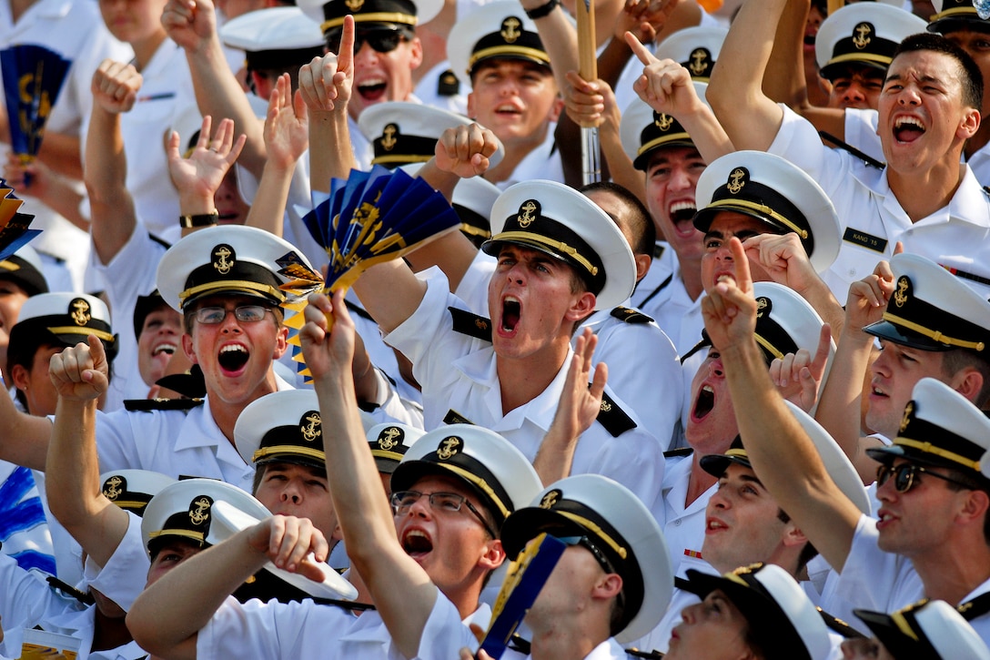 The brigade of U.S. Naval Academy midshipmen cheer a touchdown during the school's season-opening football game at Navy Marine Corps Stadium in Annapolis, Md., Sept. 3, 2011. Navy defeated the University of Delaware Blue Hens, 40-17. 