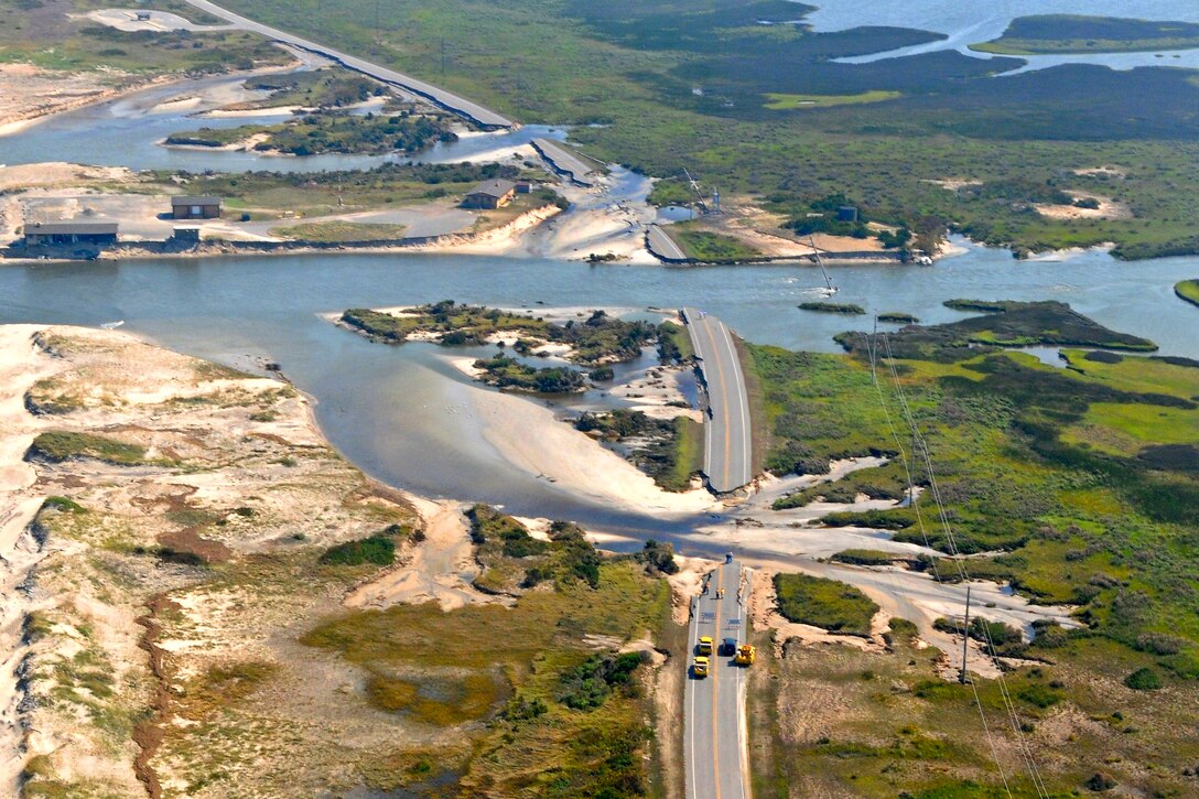 The view from an Army UH-60 Black Hawk helicopter shows highway damage from Hurricane Irene along the North Carolina coast, Aug. 28, 2011. The UH-60 crew is assigned to the 3rd Combat Aviation Brigade from Fort Stewart, Ga. The aviation unit is supporting hurricane response by civil authorities in coordination with U.S. Army North and U.S. Northern Command. 