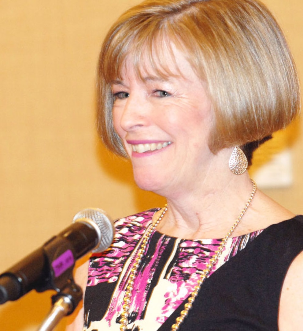 Deanie Dempsey, wife of Chairman of the Joint Chiefs of Staff Army Gen. Martin E. Dempsey, urges a group of military spouses to share their "extraordinary" stories with the American public while speaking at Military.com's 2012 Military Spouse Summit in Arlington, Va., March 3, 2012.