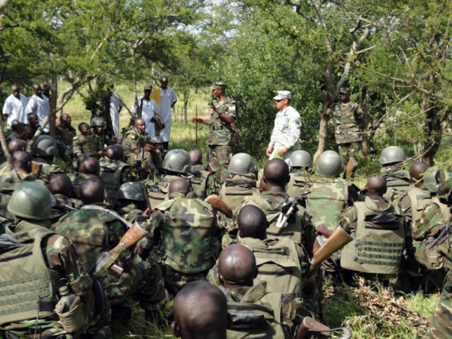 Members of the Rwandan Defense Forces participate in a lesson on urban operations from Rwandan and U.S. Army instructors during a field training portion of a month-long Peace Support Operations Soldier Skills Training course held at the Rwandan military base here Feb. 2, 2012. The RDF invited Texas Army National Guard soldiers from the U.S. Army 3rd Squadron, 124th Cavalry Regiment, in support of Combined Joint Task Force - Horn of Africa, to participate alongside Rwandan instructors during the course.