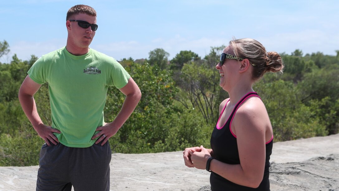 Corporal Dalton Pridmore, intelligence analyst, 15th Marine Expeditionary Unit, talks to his wife, Jamie Pridmore, in Oceanside, Calif., June 20, 2014. Pridmore and his wife are from Moody, Alabama. (U.S. Marine Corps photo by Lance Cpl. Anna Albrecht/Released)
