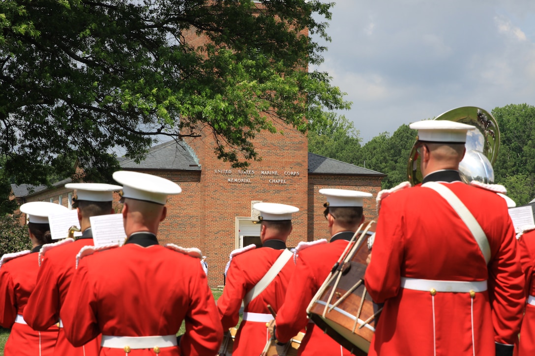 On June 25, 2014, the Marine Band, led by Gunnery Sgt. Duane King, and Marines from Marine Barracks Washington, D.C., laid to rest Lt. Gen. Ernest C. Cheatham, Jr., USMC (Ret.) at Quantico National Cemetery in Triangle, Va. In addition to his many assignments, he served as a platoon commander in Japan and Korea and battalion commanding officer for the 1st Marine Division in Vietnam, where he earned the Navy Cross and the Legion of Merit with Combat “V.” He also served as the Executive Officer, Marine Barracks, Washington, D.C.; Commanding Officer, 4th Marines; Director, Facilities and Services Division at Headquarters Marine Corps; Commanding General, Landing Force Training Command Atlantic, 4th Marine Amphibious Brigade; Deputy Chief of Staff, Plans, Policy, Joint Exercises for the Commander in Chief Atlantic Command/Commander in Chief Atlantic Fleet; Commanding General, I Marine Amphibious Force/Commanding General, 1st Marine Division; and Deputy Chief of Staff for Manpower, Headquarters Marine Corps. 

In June 1954, he left the Marine Corps to play defensive tackle for both the Pittsburgh Steelers and Baltimore Colts. He returned to active duty in March 1955. He is recognized in the Pro-Football Hall of Fame in Canton, Ohio, as the highest-ranking military member to have played professional football. (U.S. Marine Corps photo by Master Sgt. Kristin duBois/released)