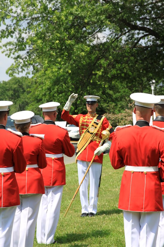 On June 25, 2014, the Marine Band, led by Gunnery Sgt. Duane King, and Marines from Marine Barracks Washington, D.C., laid to rest Lt. Gen. Ernest C. Cheatham, Jr., USMC (Ret.) at Quantico National Cemetery in Triangle, Va. In addition to his many assignments, he served as a platoon commander in Japan and Korea and battalion commanding officer for the 1st Marine Division in Vietnam, where he earned the Navy Cross and the Legion of Merit with Combat “V.” He also served as the Executive Officer, Marine Barracks, Washington, D.C.; Commanding Officer, 4th Marines; Director, Facilities and Services Division at Headquarters Marine Corps; Commanding General, Landing Force Training Command Atlantic, 4th Marine Amphibious Brigade; Deputy Chief of Staff, Plans, Policy, Joint Exercises for the Commander in Chief Atlantic Command/Commander in Chief Atlantic Fleet; Commanding General, I Marine Amphibious Force/Commanding General, 1st Marine Division; and Deputy Chief of Staff for Manpower, Headquarters Marine Corps. 

In June 1954, he left the Marine Corps to play defensive tackle for both the Pittsburgh Steelers and Baltimore Colts. He returned to active duty in March 1955. He is recognized in the Pro-Football Hall of Fame in Canton, Ohio, as the highest-ranking military member to have played professional football. (U.S. Marine Corps photo by Master Sgt. Kristin duBois/released)
