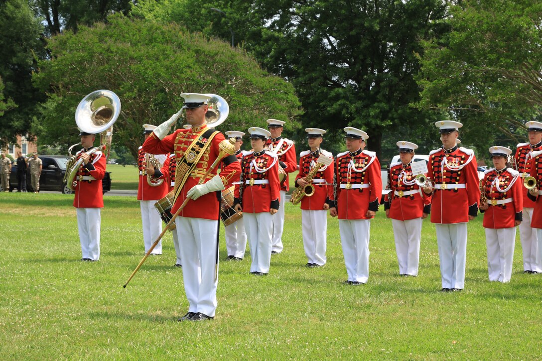 On June 25, 2014, the Marine Band, led by Gunnery Sgt. Duane King, and Marines from Marine Barracks Washington, D.C., laid to rest Lt. Gen. Ernest C. Cheatham, Jr., USMC (Ret.) at Quantico National Cemetery in Triangle, Va. In addition to his many assignments, he served as a platoon commander in Japan and Korea and battalion commanding officer for the 1st Marine Division in Vietnam, where he earned the Navy Cross and the Legion of Merit with Combat “V.” He also served as the Executive Officer, Marine Barracks, Washington, D.C.; Commanding Officer, 4th Marines; Director, Facilities and Services Division at Headquarters Marine Corps; Commanding General, Landing Force Training Command Atlantic, 4th Marine Amphibious Brigade; Deputy Chief of Staff, Plans, Policy, Joint Exercises for the Commander in Chief Atlantic Command/Commander in Chief Atlantic Fleet; Commanding General, I Marine Amphibious Force/Commanding General, 1st Marine Division; and Deputy Chief of Staff for Manpower, Headquarters Marine Corps. 

In June 1954, he left the Marine Corps to play defensive tackle for both the Pittsburgh Steelers and Baltimore Colts. He returned to active duty in March 1955. He is recognized in the Pro-Football Hall of Fame in Canton, Ohio, as the highest-ranking military member to have played professional football. (U.S. Marine Corps photo by Master Sgt. Kristin duBois/released)