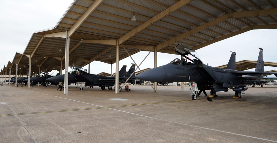 F-15E Strike Eagles are prepped for departure after participating in Green Flag East on Barksdale Air Force Base, La., June 25, 2014. More than 200 Airmen traveled from the 336th Aircraft Maintenance Unit, Seymour Johnson Air Force Base, N.C., to participate in the exercise, which is a simulated combat operation held to employ close air support and hone communication between air and ground forces. (U.S. Air Force photo/Senior Airman Kristin High)