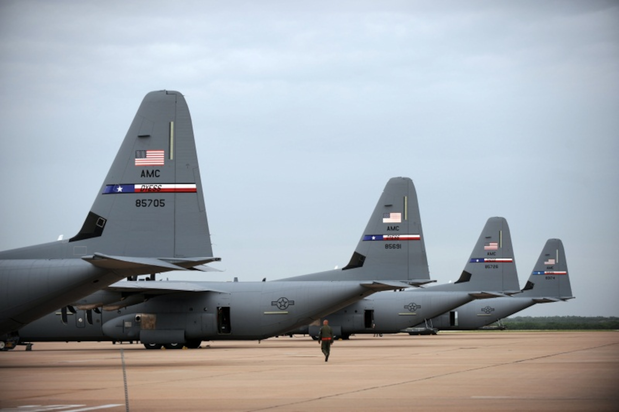 Four U.S. Air Force C-130J Super Hercules from the 39th Airlift Squadron, sit on the flightline June 21, 2014, at Dyess Air Force Base, Texas. They were part of a Joint Forcible Entry exercise of 21 aircraft that were made up of a combination of C-130J Super Hercules and C-130H Legacy. (U.S. Air Force photo by Airman 1st Class Alexander Guerrero/Released)