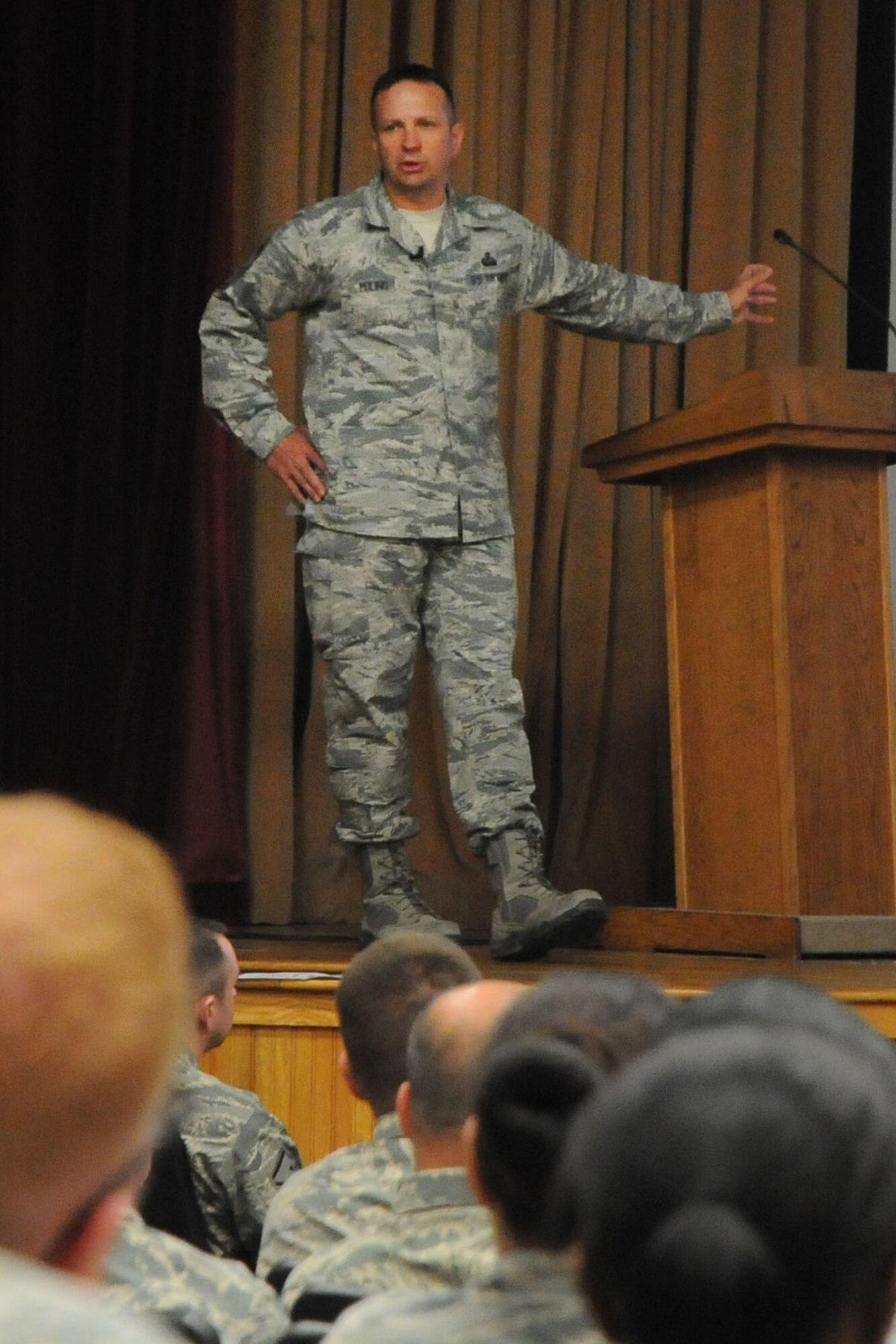 HANSCOM AIR FORCE BASE, Mass. -- Command Chief Master Sgt. Craig A. Poling held an enlisted all-call at the base theater June 24. Poling spoke about enlisted topics such as the Developmental Special Duty, professional military education, Airmen's Comprehensive Assessment and more. (U.S. Air Force photo by Mark Herlihy)