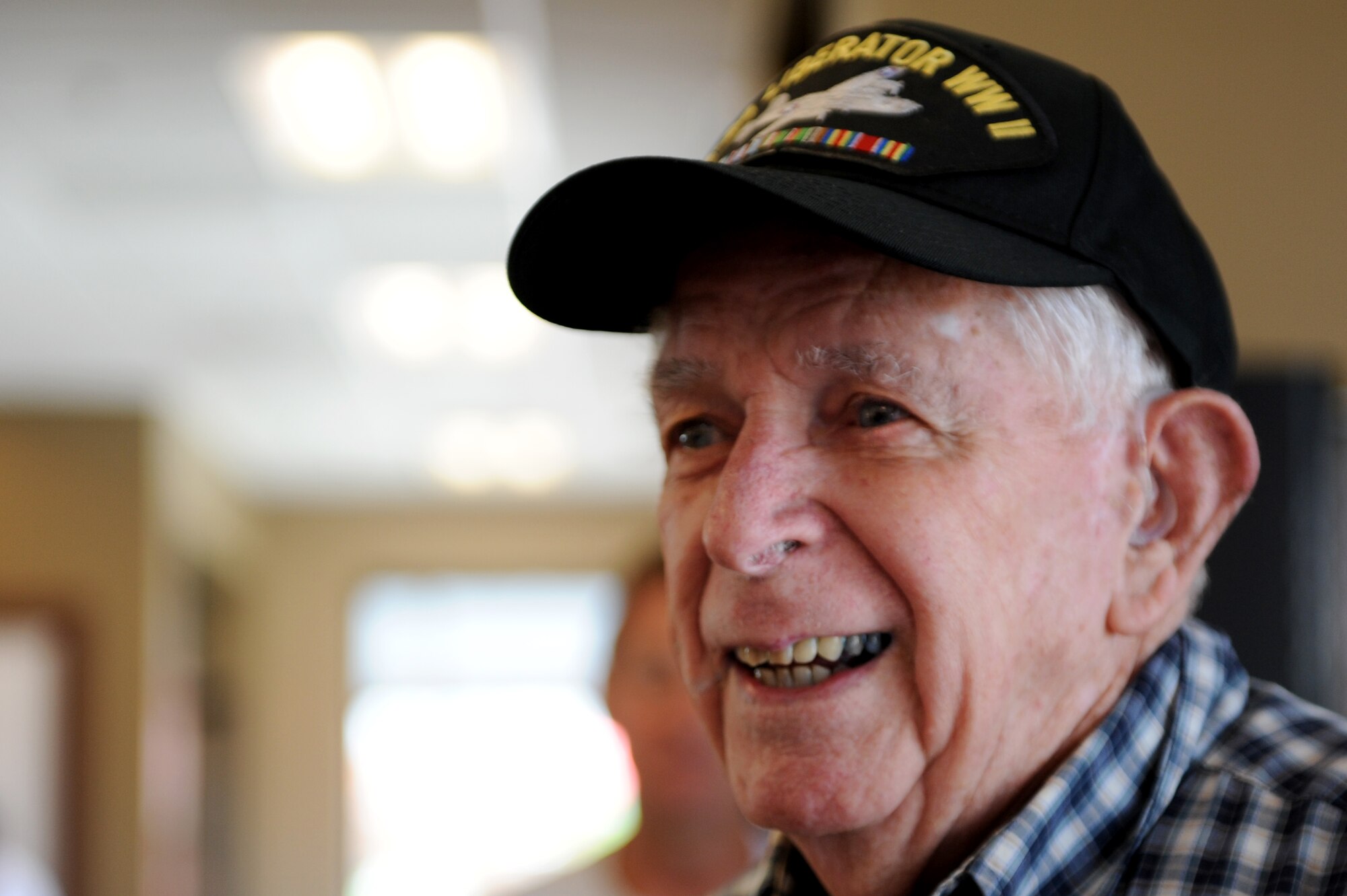 Dale VanBlair, World War II veteran, addresses the crowd that honored him for his 93rd birthday in Belleville, Ill. on June 17, 2014. VanBlair thanked everyone for coming to his birthday party and told them that it felt amazing to be appreciated. (U.S. Air Force photo by Senior Airman Sarah Hall-Kirchner/Released)