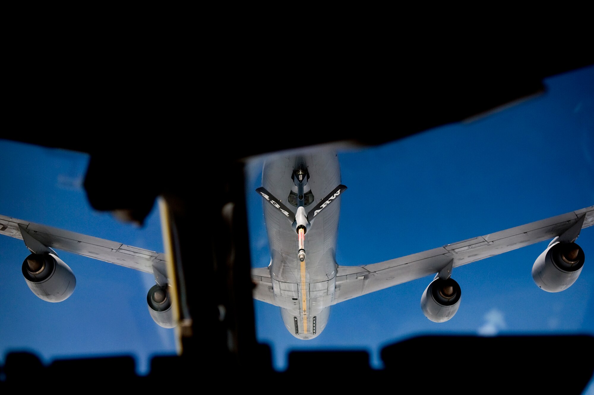 A 434th Air Refueling Wing KC-135R Stratotanker from Grissom Air Reserve Base, Ind., can be seen from the flight deck of a C-17 Globemaster III from the 445th Airlift Wing at Wright-Patterson Air Force Base, Ohio, during a training mission June 18, 2014. The main mission of the KC-135 is to provide inflight refueling to long-range bomber, fighter and cargo aircraft. (U.S. Air Force photo/Tech. Sgt. Mark R. W. Orders-Woempner)