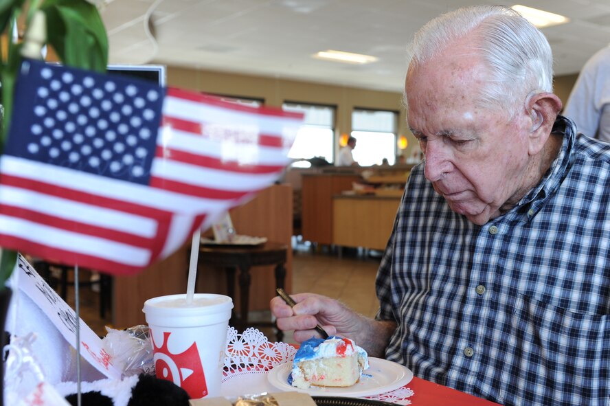 Dale VanBlair, World War II veteran, eats a birthday cake while celebrating his 93rd birthday in Belleville, Illinois, June 17, 2014. VanBlair was a tailgunner on the B-24 Liberator during WWII. (U.S. Air Force photo/Senior Airman Sarah Hall-Kirchner)