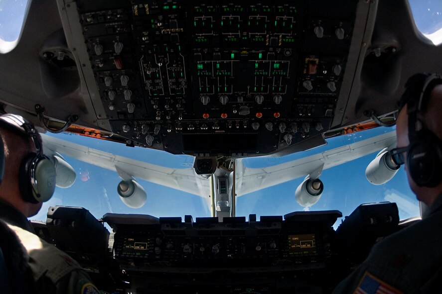 C-17 Globemaster III pilots from the 445th Airlift Wing at Wright-Patterson Air Force Base, Ohio, fly behind a 434th Air Refueling Wing KC-135R Stratotanker from Grissom Air Reserve Base, Ind., during a training mission June 18, 2014. The C-17 is the newest and most flexible cargo aircraft in the airlift force. (U.S. Air Force photo/Tech. Sgt. Mark R. W. Orders-Woempner)
