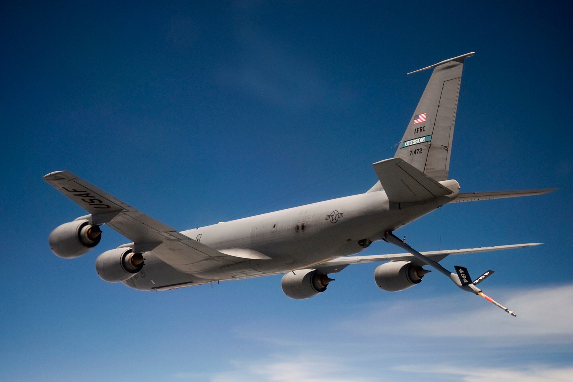 A KC-135R Stratotanker from the 434th Air Refueling Wing at Grissom Air Reserve Base, Ind., flies over Ohio shortly after refueling a C-17 Globemaster III from the 445th Airlift Wing at Wright-Patterson Air Force Base, Ohio, June 18, 2014. The main mission of the KC-135 is to provide inflight refueling to long-range bomber, fighter and cargo aircraft. (U.S. Air Force photo/Tech. Sgt. Mark R. W. Orders-Woempner)