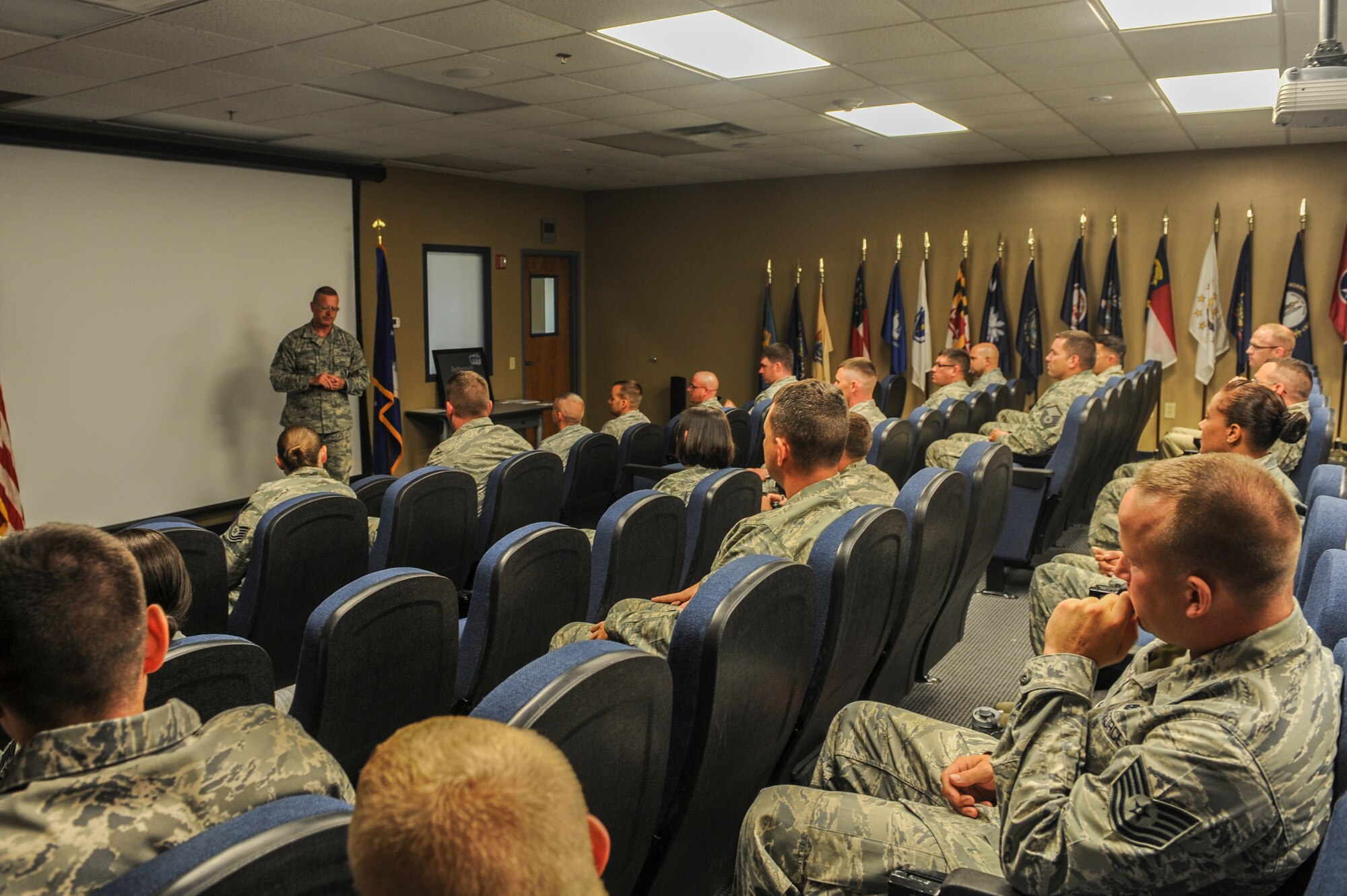 U.S. Air Force Chief Master Sgt. Michael Goetz, 93d Air Ground Operations Wing command chief, speaks to potential first sergeants during a First Sergeant Symposium at Moody Air Force Base, Ga., June 18, 2014. Goetz talked about a few duties first sergeants have and the importance of keeping good relationships with Airmen. (U.S. Air Force photo by Air Force Airman 1st Class Alexis Millican/Released)