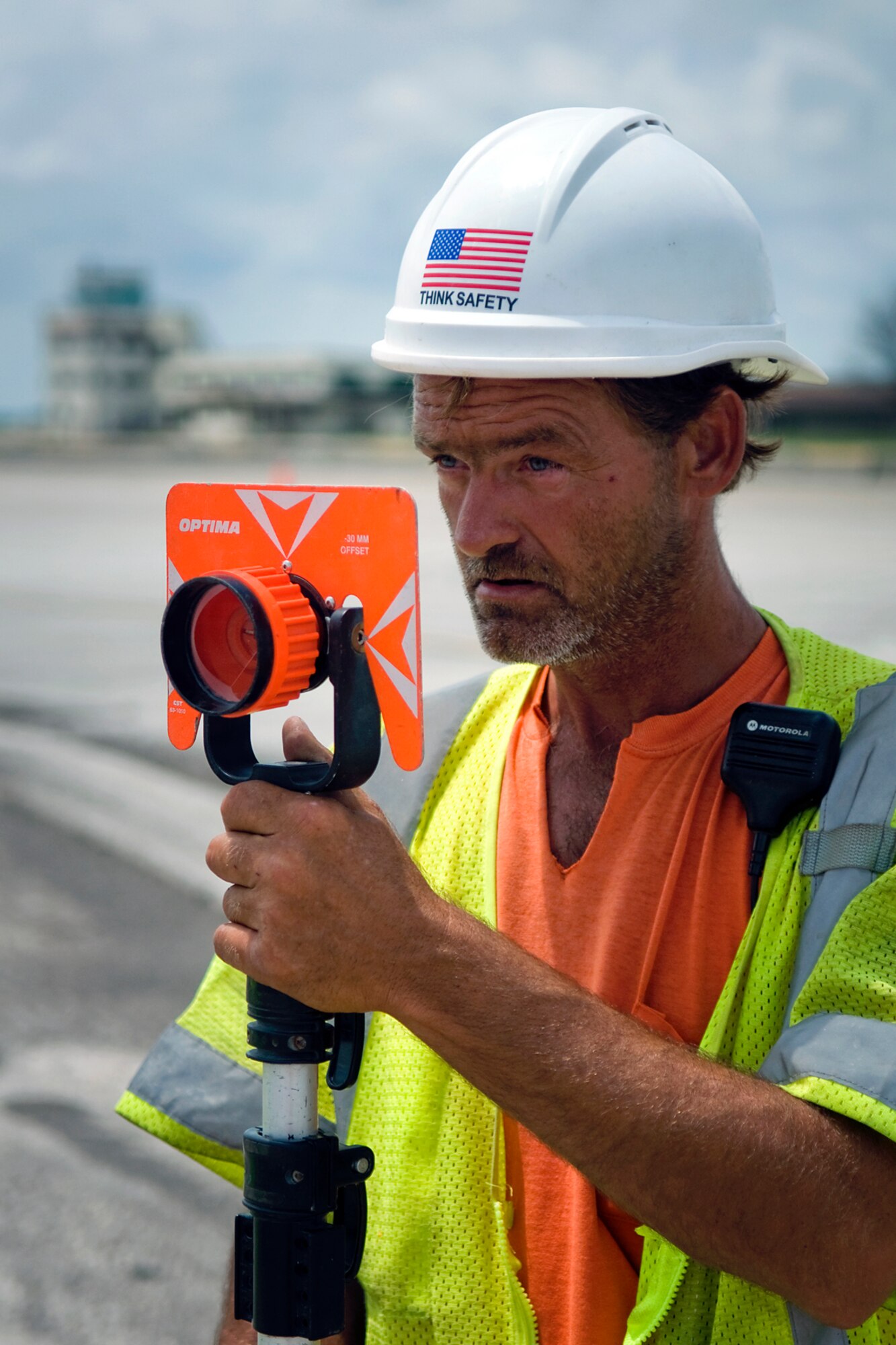 Don Thien, a contractor working on the runway at Grissom Air Reserve Base, Ind., uses a measuring device to document the position of expansion joints on a taxiway at the north-central Indiana base June 20, 2014. Six one-inch expansion joints are being replaced and parts of the runway and taxiway surfaces are being repaved. (U.S. Air Force photo/Tech. Sgt. Mark R. W. Orders-Woempner) 