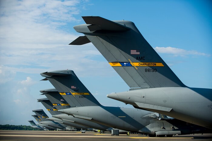 437th Airlift Wing Globemaster III C-17s line the ramp, June 24, 2014, at Joint Base Charleston, S.C. The maintainers perform daily checks and maintenance to ensure the aircraft are ready to fly. (U.S. Air Force photo/Senior Airman George Goslin)