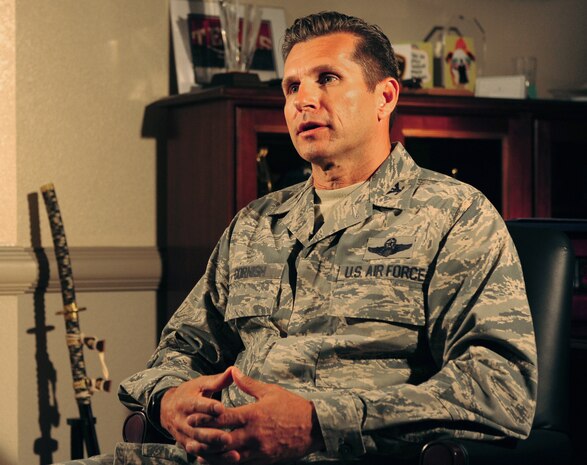 Col. Barry Cornish, 99th Air Base Wing commander, sits for a media interview answering questions about his air force career June 17, 2014 at Nellis Air Force Base, Nev.  Cornish is set to relinquish command during a ceremony here June 27th, after 2 years in the position. The 99th ABW provides installation support for more than 10,000 personnel assigned to Nellis AFB, Creech AFB, and the Nevada Test & Training Range. (U.S. Air Force photo by Airmen 1st Class Joshua Kleinholz) 