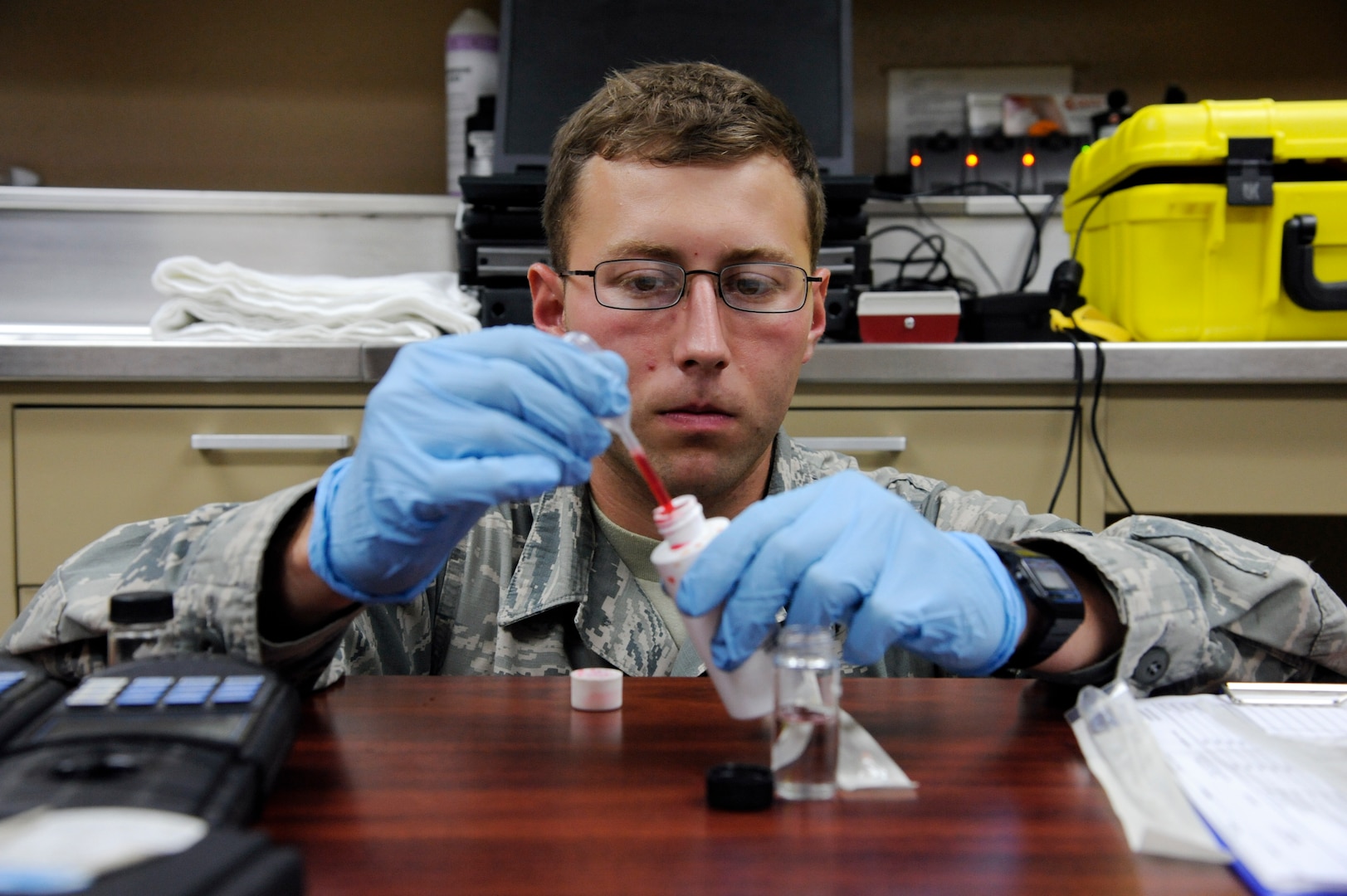 Airman 1st Class Tyler Brantley, 359th Medical Group bioenvironmental engineering, tests the pH levels in a water sample June 19 at Joint Base San Antonio-Randolph. (U.S. Air Force photo by Desiree Palacios)