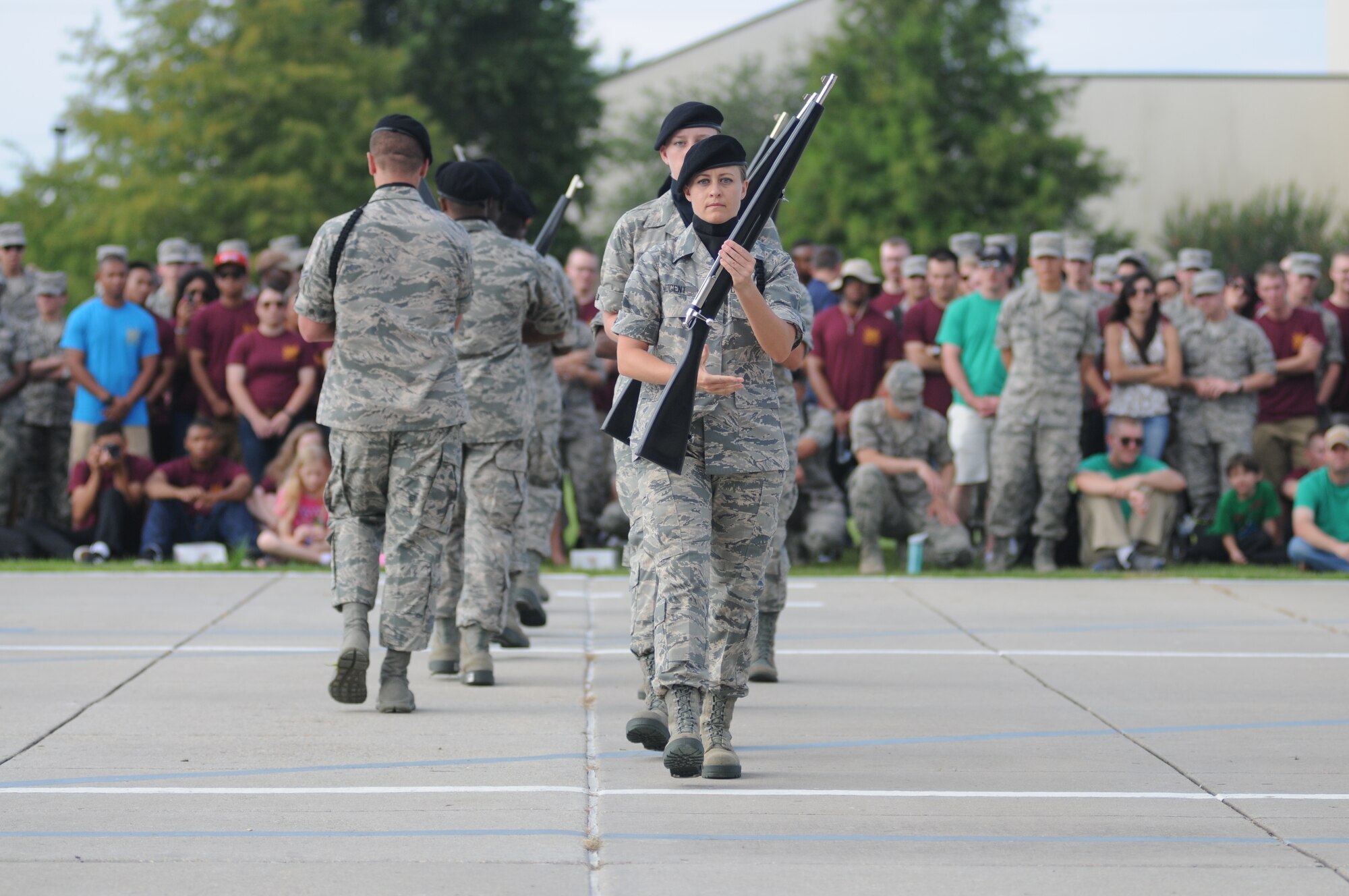 Airman 1st Class Stefanie Nugent, 334th Training Squadron, performs during the freestyle portion of the 81st Training Group drill down June 20, 2014, at the triangle, Keesler Air Force Base, Miss.  The 334th Gators placed third in the freestyle competition and overall.  (U.S. Air Force photo by Kemberly Groue)