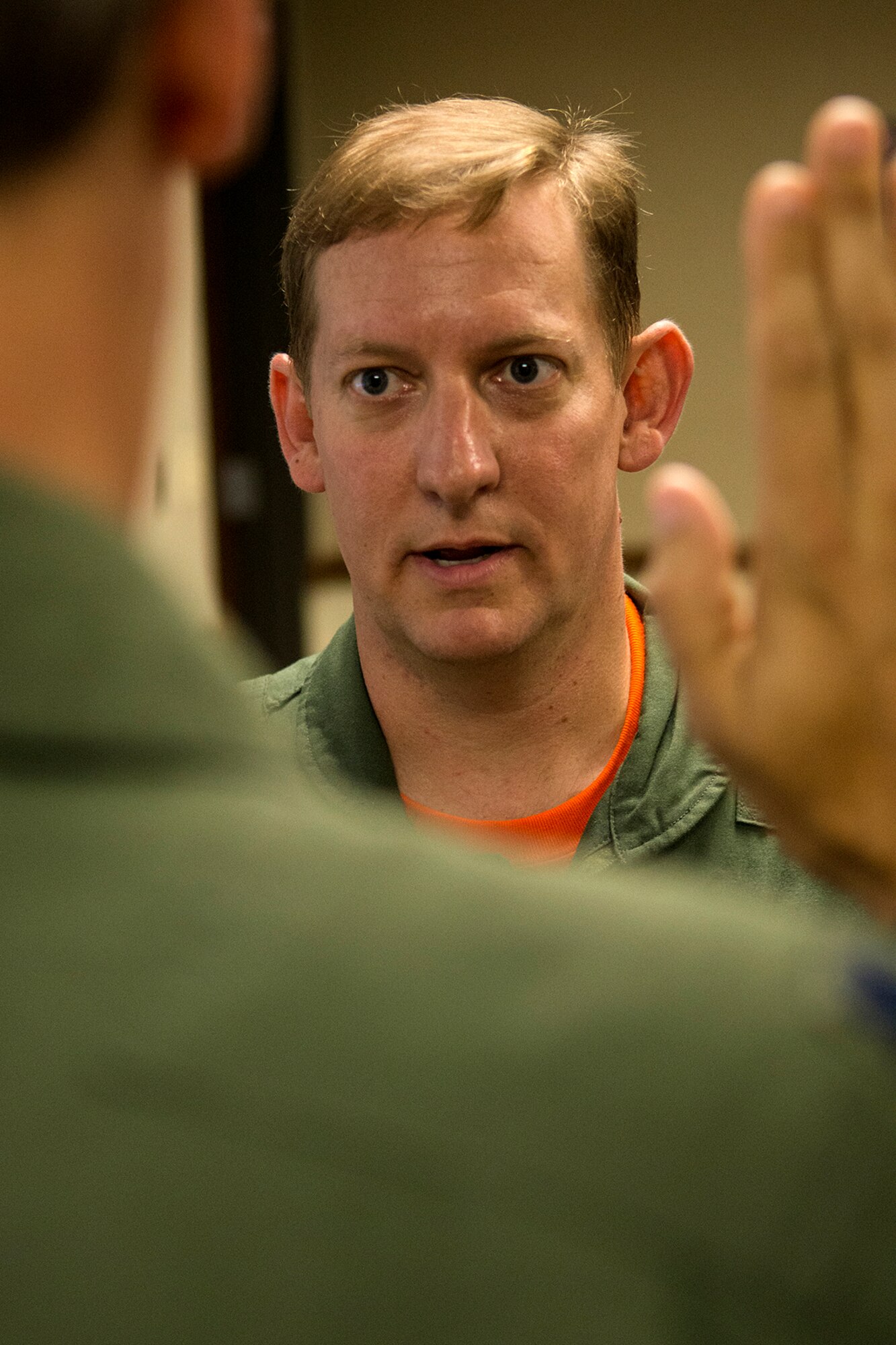 U.S. Air Force Maj. Linden Adams recites the Oath of Office during his Pinning On ceremony, June 20, 2014, Barksdale Air Force Base, La. Linden is assigned to the 343rd Bomb Squadron and was recently promoted to the rank of Major. (U.S. Air Force photo by Master Sgt. Greg Steele/Released)
