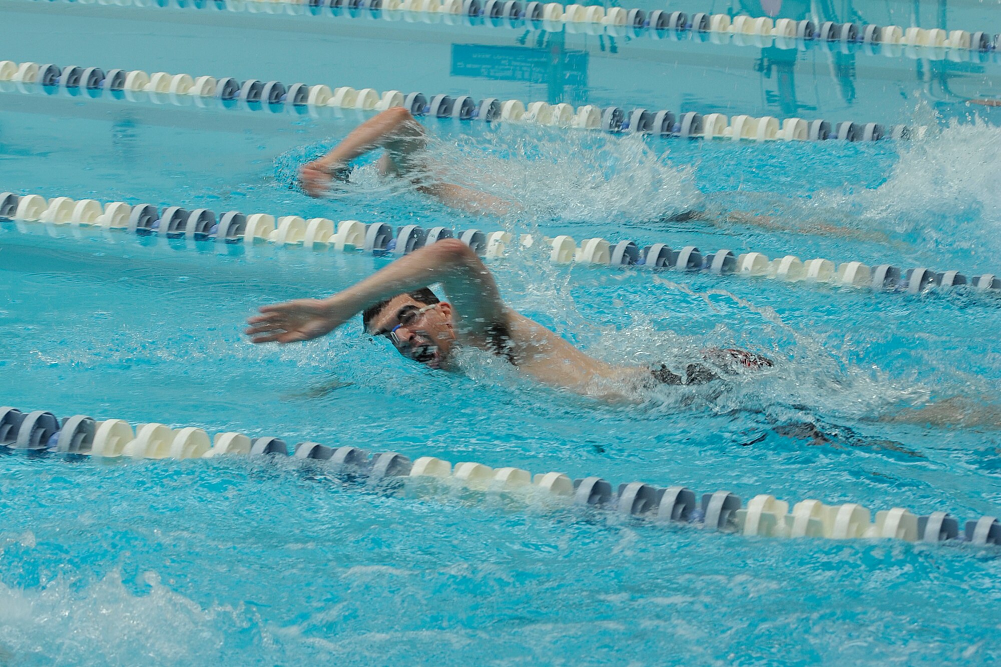 PETERSON AIR FORCE BASE, Colo. – Dozens of swimmers competed in Team Pete’s 2014 sports and field day June 19 here. There were multiple swimming distances including the 50m, 100m and 200m for both men and women. (U.S. Air Force photo/Dennis Howk)